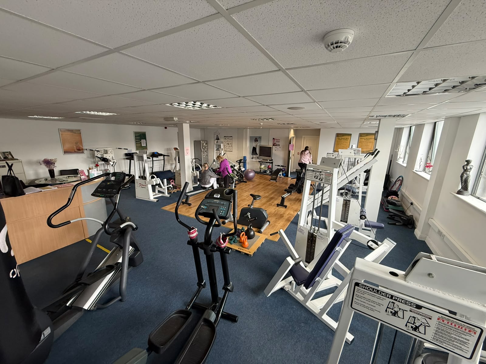The reception desk and training floor at Fitness Express
